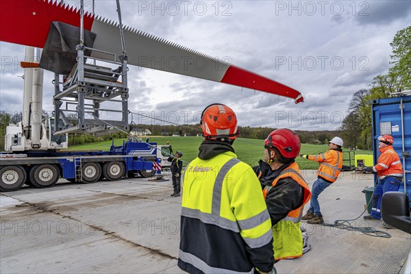 Preparation for the transport of a 68 metre long blade, a wind turbine, with a self-propelled Blade-Lifter vehicle, over a 40 km long route in the Bergisches Land, through towns, villages, over country roads, narrow through roads, to the construction site of the wind turbine near Hagen, North Rhine-Westphalia, Germany, Europe