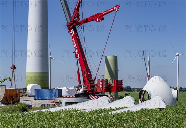 Repowering of a wind farm near Issum, 9 older wind turbines from the manufacturer Enercon (model series E-58) will be dismantled, which have been in operation for over two decades, will be replaced by a total of four Enercon E-160 turbines, under construction, with a total output of 22 megawatts, Lower Rhine, North Rhine-Westphalia, Germany, Europe