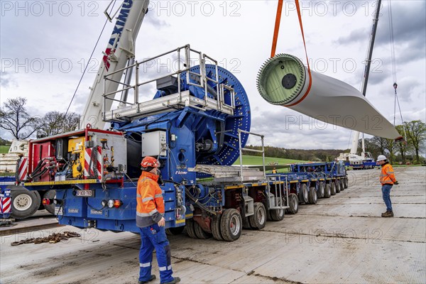 Preparation for the transport of a 68 metre long blade, a wind turbine, with a self-propelled Blade-Lifter vehicle, over a 40 km long route in the Bergisches Land, through towns, villages, over country roads, narrow through roads, to the construction site of the wind turbine near Hagen, North Rhine-Westphalia, Germany, Europe