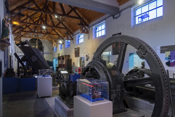 Vintage dynamo and old machines in the Industrial Museum at the Le Bois du Cazier coal mine, Marcinelle near Charleroi, province of Hainaut, Belgium, Europe