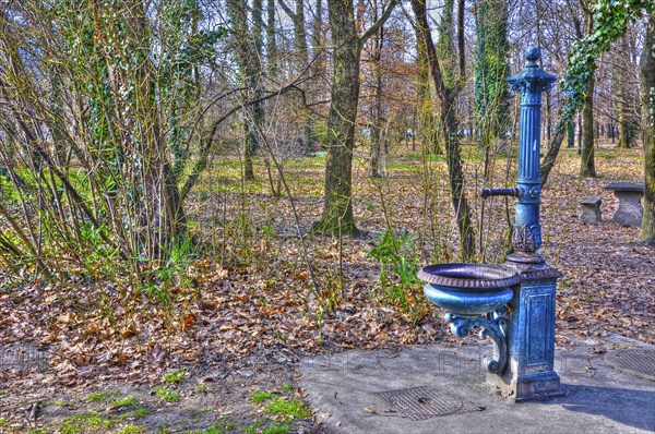 Old Blue Beautiful and Elegant Water Fountain in the Forest in Locarno, Ticino, Switzerland, Europe