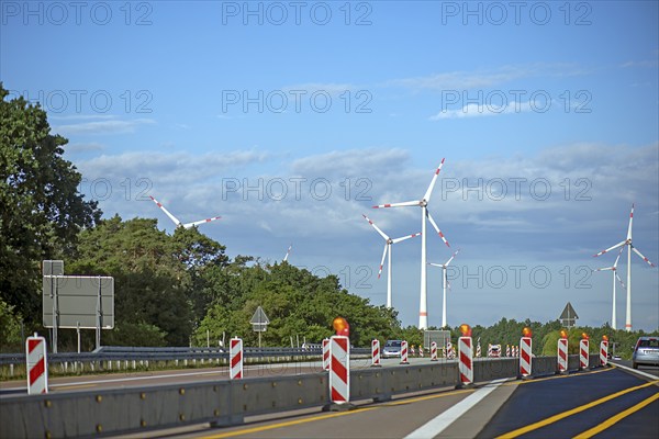 Wind turbines on the A 9 motorway, cloudy sky, Brandenburg, Germany, Europe