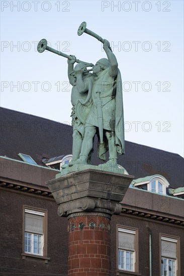 Lurspieler, antique trumpets, bronze sculpture on terracotta column, Town Hall Square, Rathausplatz or Rådhuspladsen, Copenhagen, Denmark, Europe