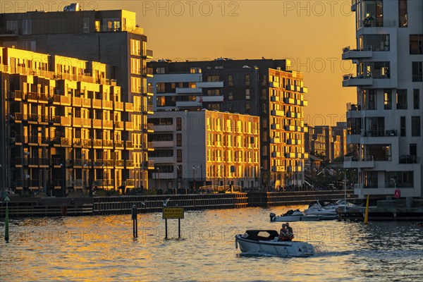 Residential buildings, apartment buildings, condominiums, at the harbour, Havneholmen and Nobelholmen (left), at the Sydhavnen district, in the evening light, Copenhagen, Denmark, Europe