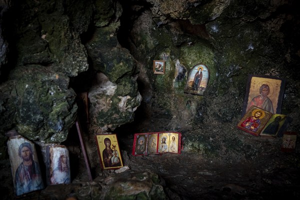 Protaras, Cyprus, August 6 2020: Interior of an old church cave with Christian saint. Ayioi Saranta orthodox chapel, Europe
