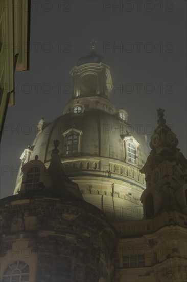 Dresden's old town shrouded in November fog. Church of Our Lady, Foggy atmosphere in Dresden, Dresden, Saxony, Germany, Europe