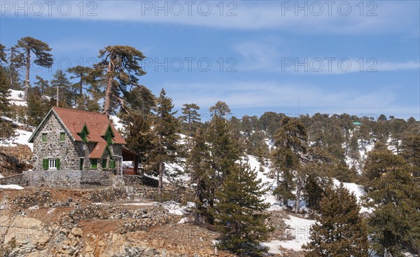 Idyllic mountain chalet and landscape Troodos mountains in Cyprus during winter