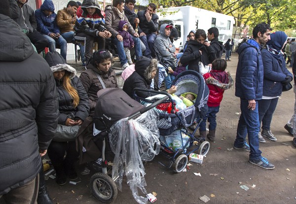 Refugees from Syria waiting to be registered at the Central Reception Centre for Asylum Seekers at the Berlin State Office for Health and Social Affairs, 09.10.2015