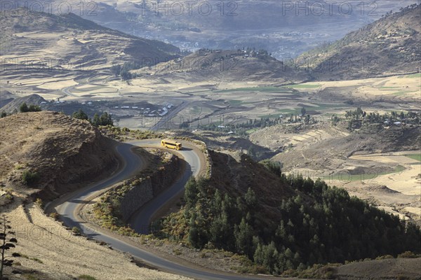 Mountain landscape, bus on a winding road in the highlands between Mekele and Lalibela, Ethiopia, Africa