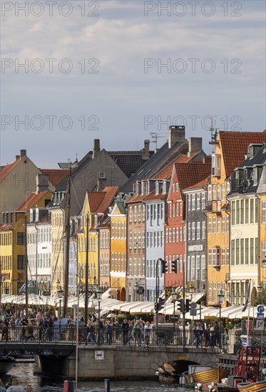 Nyhavn, in the Frederiksstaden district, harbour district with houses over 300 years old, moored sailing boats, promenade with many cafés, pubs, restaurants, canal, tourist attraction, Copenhagen, Denmark, Europe