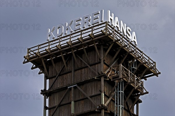 The extinguishing tower with the lettering of the Hansa coking plant, landmark in Dortmund-Huckarde, Ruhr area, North Rhine-Westphalia, Germany, Europe