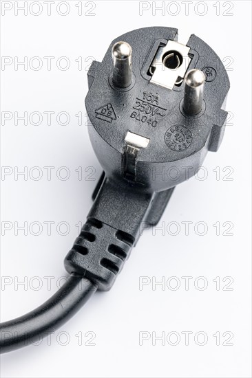 Close-up of a Schuko plug on a white background