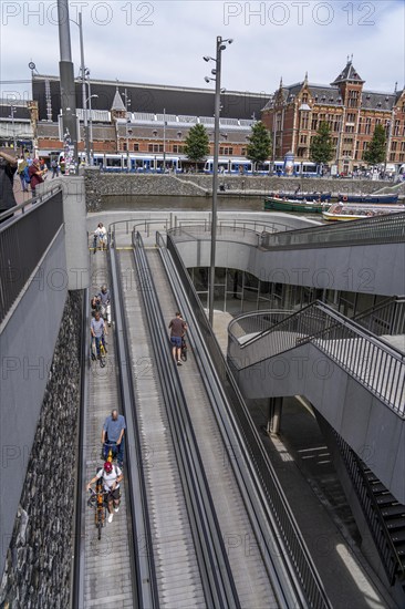 New bicycle car park at Amsterdam Central Station, Stationsplein, space for around 7000 bicycles, largest in Amsterdam, digitally monitored, underground, direct connection to the station and metro, Netherlands, escalators lead to the bicycle garage, Netherlands