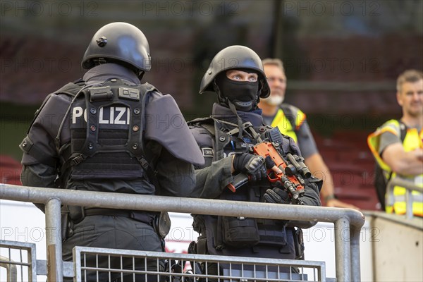 Baden-Württemberg police anti-terror exercise in the stadium. In the run-up to the European Football Championships, 1200 police officers rehearse for an emergency. Scenario: stabbing in the stands of the MHP Arena, VfB Stuttgart's stadium, which is also the venue for five European Championship matches. After initial treatment by the police, the handover of the injured to the emergency services and fire brigade was also rehearsed. Stuttgart, Baden-Württemberg, Germany, Europe