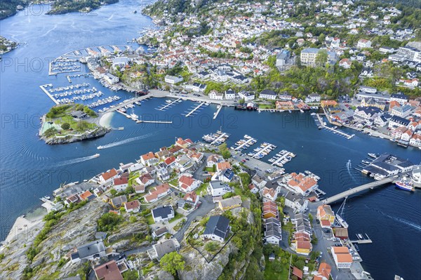 Aerial view of island Kragerø, traditional village with marinas at the southern norwegian coast, typical white wooden houses at the waterfront, Norway, Europe
