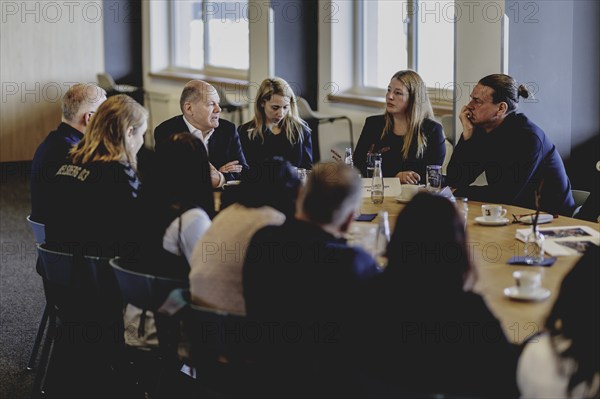 Olaf Scholz (SPD), Federal Chancellor, at a meeting with migrants and people involved in the field at SV Babelsberg in Potsdam, 26 February 2024