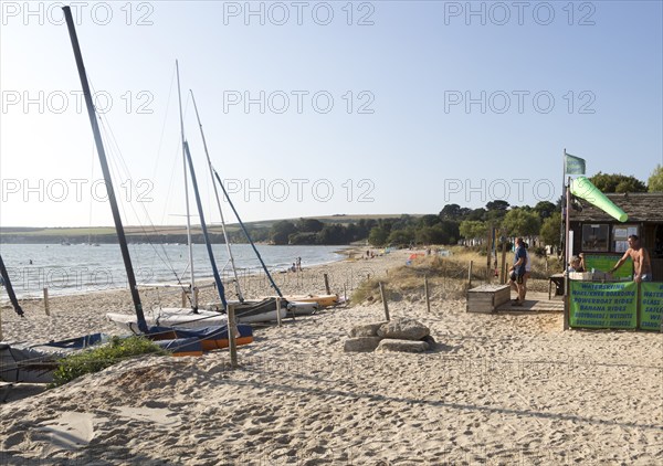 Early morning quiet at Knoll beach, Studland Bay, Swanage, Dorset, England, UK