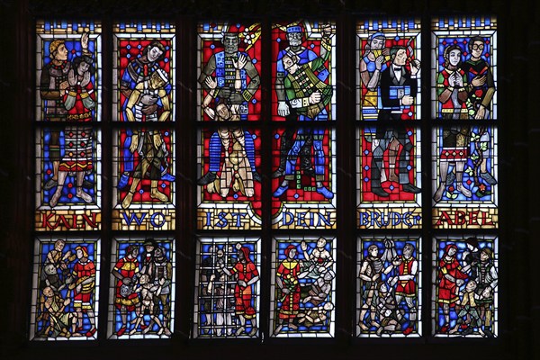 Colourful stained glass window with inscription Cain where is your brother Abel, Genesis 4, 9, bible quotation, bible passage, first, Moses, fratricide, question, sin, biblical, black, blue, red, silhouette, stained glass, arts and crafts, Katharinenkirche, Oppenheim, Rhine-Hesse region, Rhineland-Palatinate, Germany, Europe
