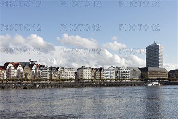 Mannesmannufer, row of houses and Rhine promenade, Mannesmann tower block, Düsseldorf, North Rhine-Westphalia, Germany, Europe
