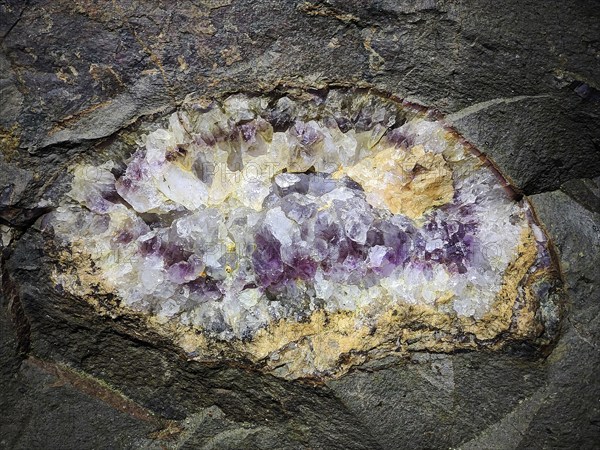 Minerals in the rock of the visitor gallery of the Steinkaulenberg gemstone mines, show mine in Idar-Oberstein, Rheinpland-Pfalz, Germany, Europe