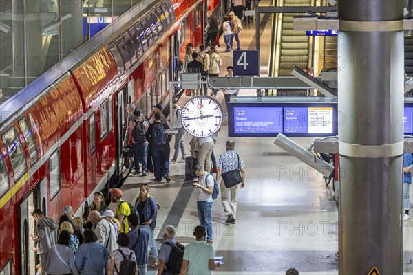 Platform with passengers, Gesundbrunnen station with Deutsche Bahn AG regional train. Berlin, Germany, Europe