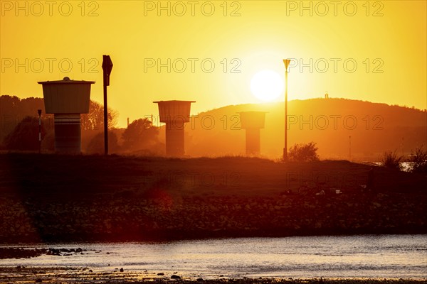Rhine at Duisburg-Bruckhausen, towers of the water extraction facilities of ThyssenKrupp Steel steelworks, Duisburg, North Rhine-Westphalia, Germany, Europe