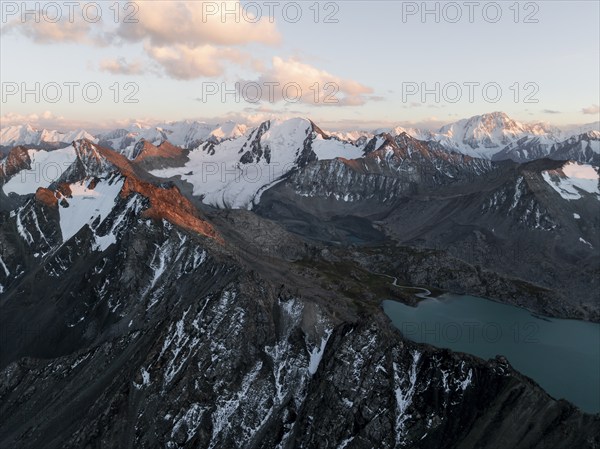 Evening mood, mountain panorama, aerial view, 4000 metre peak with glacier, mountain pass and mountain lake Ala-Kul Lake, Tien Shan, Kyrgyzstan, Asia