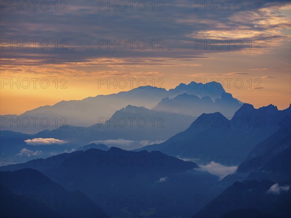 Silhouette of the Hoher Dachstein in the haze at dawn, Roßfeld, Golling, Salzburg province, Austria, Europe