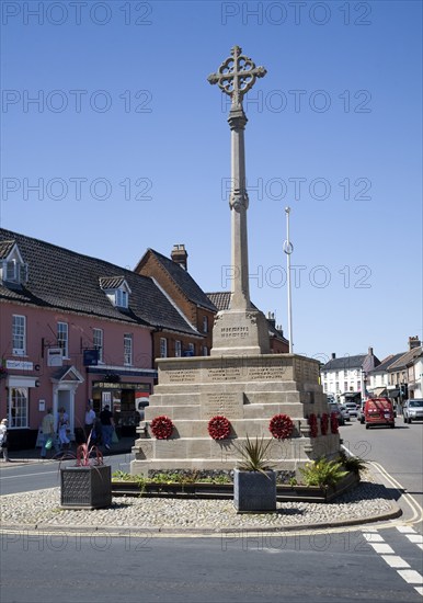 War memorial and historic buildings in the town of Holt, north Norfolk, England, United Kingdom, Europe