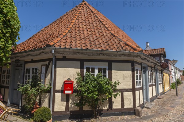 Odense, cobblestone street in the old town, half-timbered house, colourful houses, Fyn, island of Funen, Denmark, Europe
