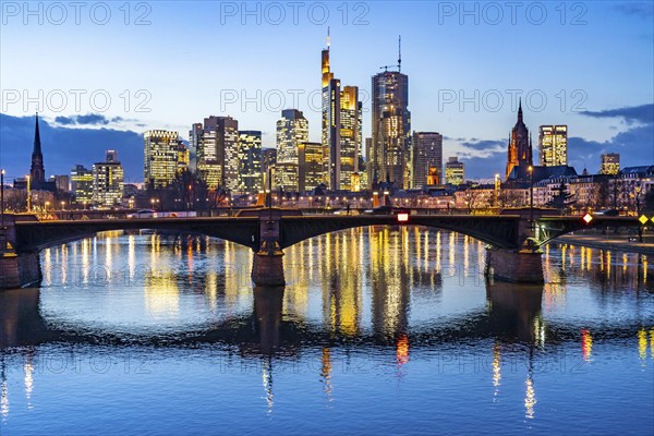 Skyline of the city centre of Frankfurt am Main, river Main, dusk, Ignatz-Bubis-Brücke, Hesse, Germany, Europe