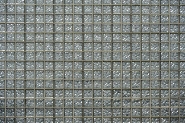 A wall of glass blocks in a regular, geometric pattern, Sandnes, Fylke Rogaland, Norway, Europe