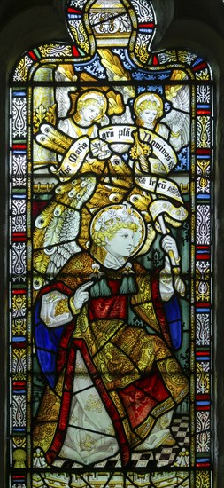 Stained glass window of Annunciation by Charles Eamer Kempe, church of Saint Botolph, Burgh, Suffolk, England, UK c 1902, Angel Gabriel