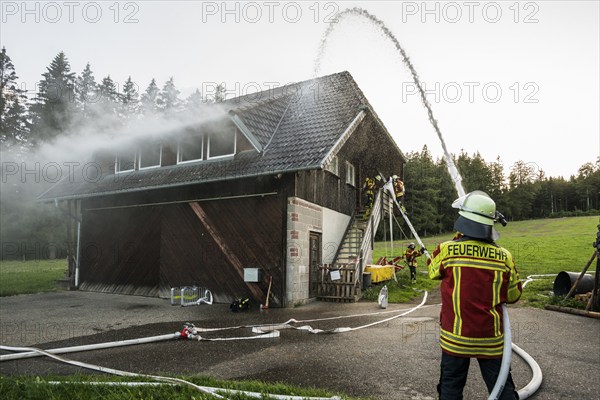 Fire brigade operation at a house fire, St Peter, Southern Black Forest, Black Forest, Baden-Württemberg, Germany, Europe