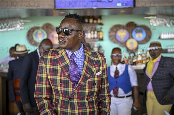 Sapeur, member of the Société des Ambianceurs et des Personnes élégantes (SAPE), society of entertainers and stylish people, Brazzaville, Republic of Congo