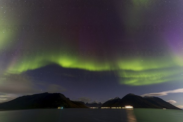 Northern Lights, (Aurora borealis) at a fjord near Skjiervoya, September 2024, Lapland, Finnmark, Norway, Europe