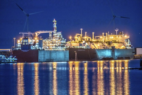 EemsEnergyTerminal, floating LNG terminal in the seaport of Eemshaven, tankers bring liquefied natural gas to the two production ships, Eemshaven LNG and Golar Igloo, which thaw the liquefied gas and feed it into the normal natural gas grid, in operation since September 2022, Netherlands