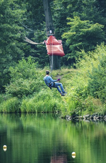 Tree 2 Tree, climbing garden, high ropes course in the Wedau sports park, at the regatta course, 240 metre long rope slide over the parallel canal, Duisburg, North Rhine-Westphalia, Germany, Europe