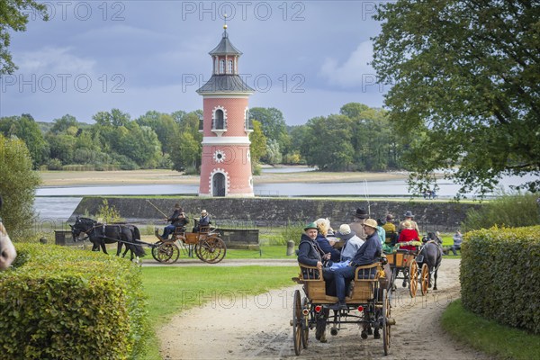 Presentation and route ride, all carriages in stylish tension, popular sporting event over approx. 30 km. An event organised by Reit- und Fahrverein Moritzburg e.V. Carriage at the lighthouse, 29th Moritzburger Teichrundfahrt, Moritzburg, Saxony, Germany, Europe