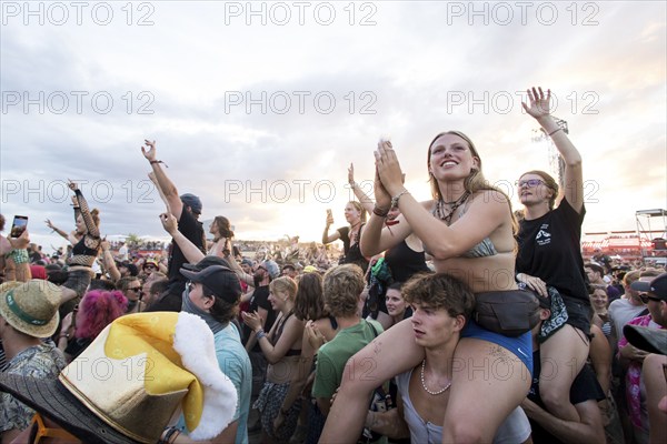 Festival visitors are carried on shoulders during the performance of the band Feine Sahne Fischfilet at the Highfield Festival on Saturday, Störmthaler See, 17/08/2024