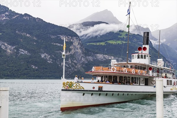 Flüelen landing stage, historic paddle steamer URI. With the excursion boat to sights on Lake Lucerne. Flüelen, Canton Uri, Switzerland, Europe