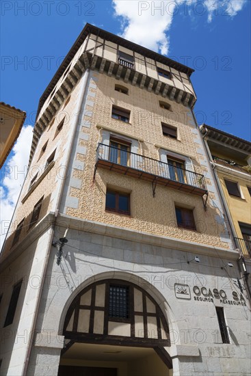 High, antique building complex designed with stone, has balconies and large windows, Toledo, Castilla-La Mancha, Spain, Europe