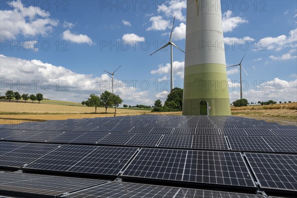Wind farm near Lichtenau, Ostwestfalen-Lippe, a 100 kW solar power system was installed on the crane installation area in front of a wind turbine, as a trial, so the unused former construction site areas could be used for PV systems, North Rhine-Westphalia, Germany, Europe