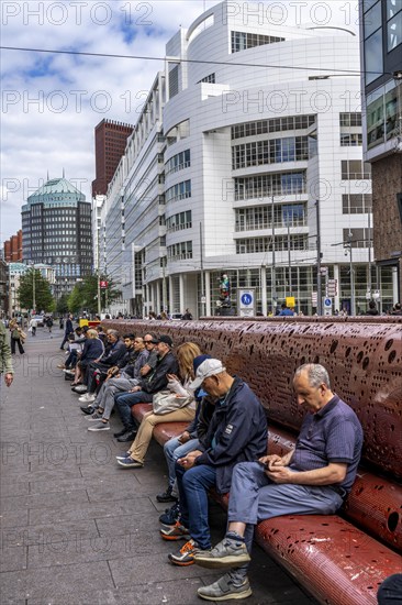 Grote Marktstraat, shopping street, long bench, pedestrian zone, in the city centre of The Hague, Netherlands
