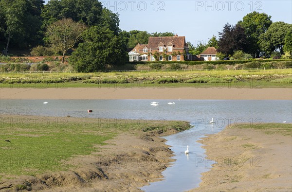 Large country house at Broomheath, Kyson Point, Martlesham Creek, River Deben, near Woodbridge, Suffolk, England, UK