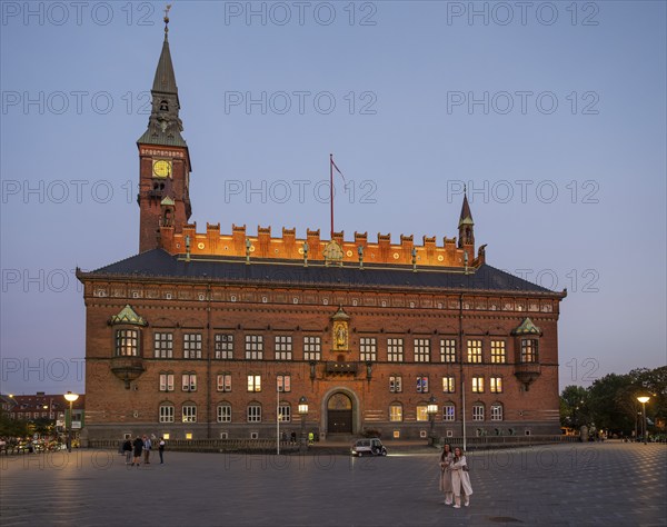 Illuminated City Hall in the National Romantic style by Martin Nyrop, City Hall Square or Rådhuspladsen in the evening, Copenhagen, Denmark, Europe