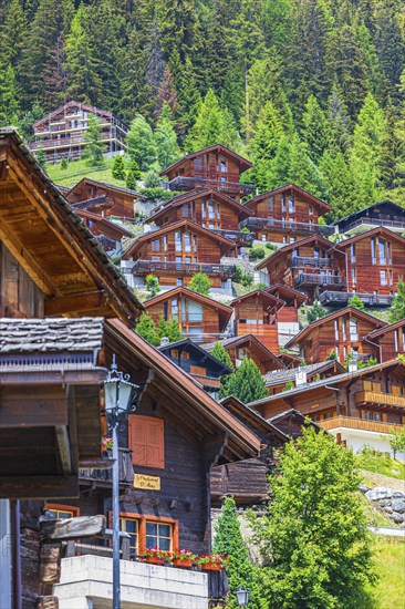 New chalets built into a slope, Grimentz, Val d'Anniviers, Valais Alps, Canton Valais, Switzerland, Europe