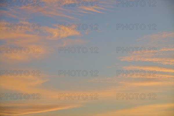 Gentle sunset with soft pastel clouds in the blue sky, calming atmosphere, sunset, North Sea, Denmark, Europe