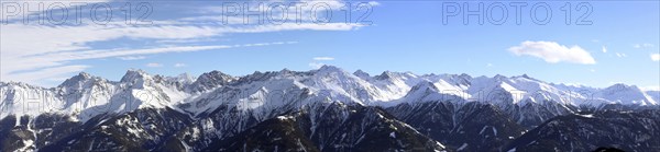 Alpine panorama with snow-covered mountain peaks in winter. Taken in the ski resort of Serfaus Fiss Ladis (Tyrol, Austria)