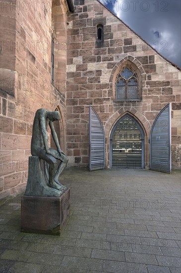 Main entrance of St Clare's Church, on the left the bronze sculpture of Job, created by the German sculptor Gerhard Marcks in 1957, St Clare's Church, Königstraße 66, Nuremberg, Middle Franconia, Bavaria, Germany, Europe